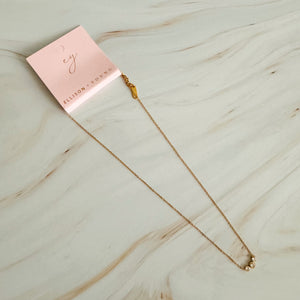 The Elara Three-Stone Necklace